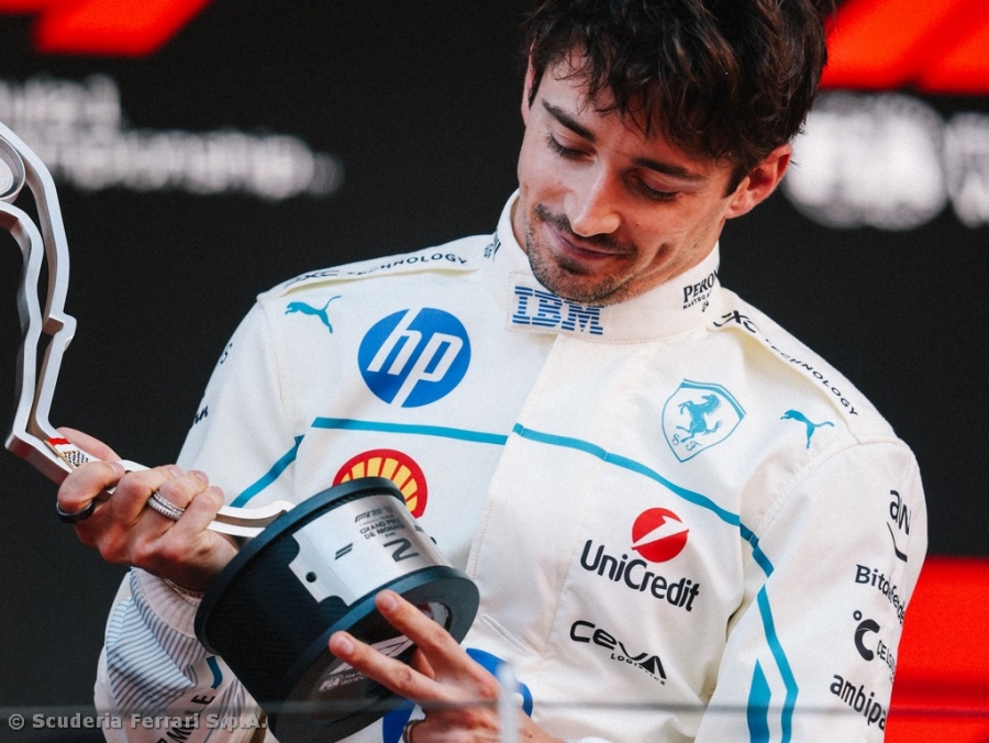 Charles on the podium at home
